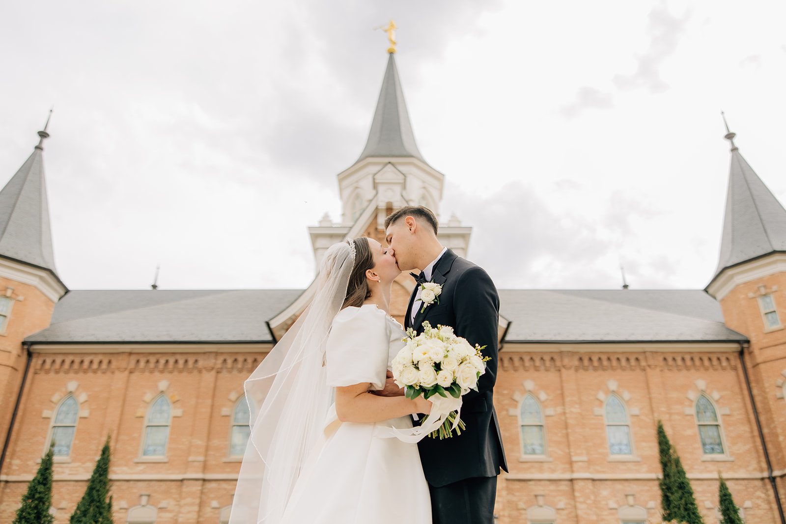 bride and groom at the City center provo temple