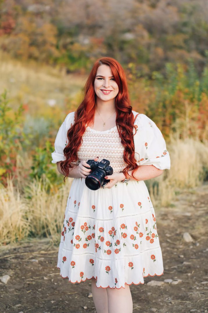 photographer holding a camera