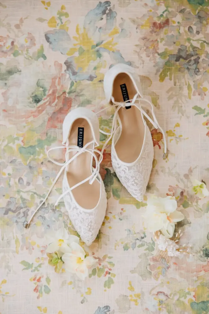 utah wedding photographers, wedding details brides wedding shoes on a floral mat